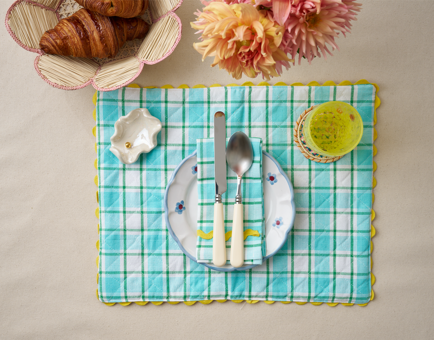 A Pair of Aqua and Orchid Reversible Placemats