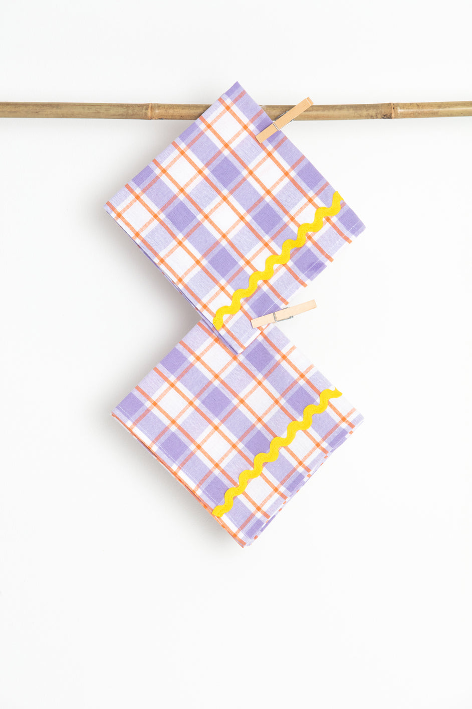 A Pair of Purple and Yellow Napkins
