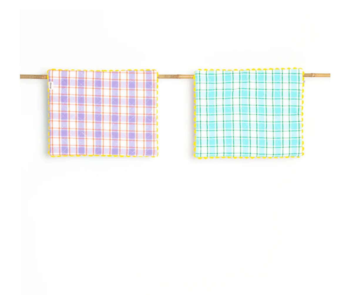 A Pair of Aqua and Orchid Reversible Placemats